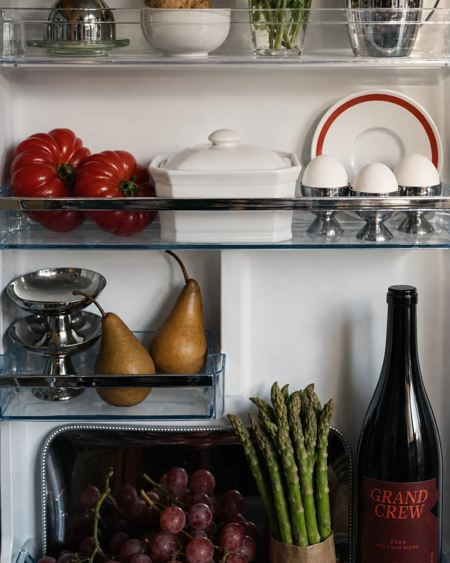 Grand Crew Red Field Blend placed with food inside a carefully styled refrigerator